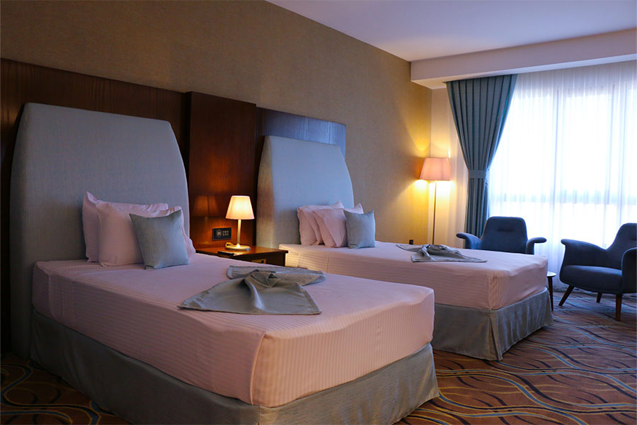 hotel-qasr-alziafat-qods-mashhad-twin-bed